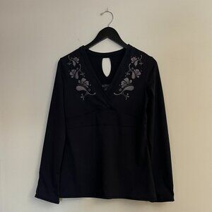 Athleta Black Long Sleeve Keyhole Top with Gray Floral Embellishment, Size M